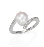 $1.00 18kw Diamond and Pearl By-Pass Ring
